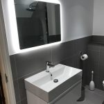 Beautiful LED mirror installed as part of Bathroom Conversion to Shower Room project in Great Doddington