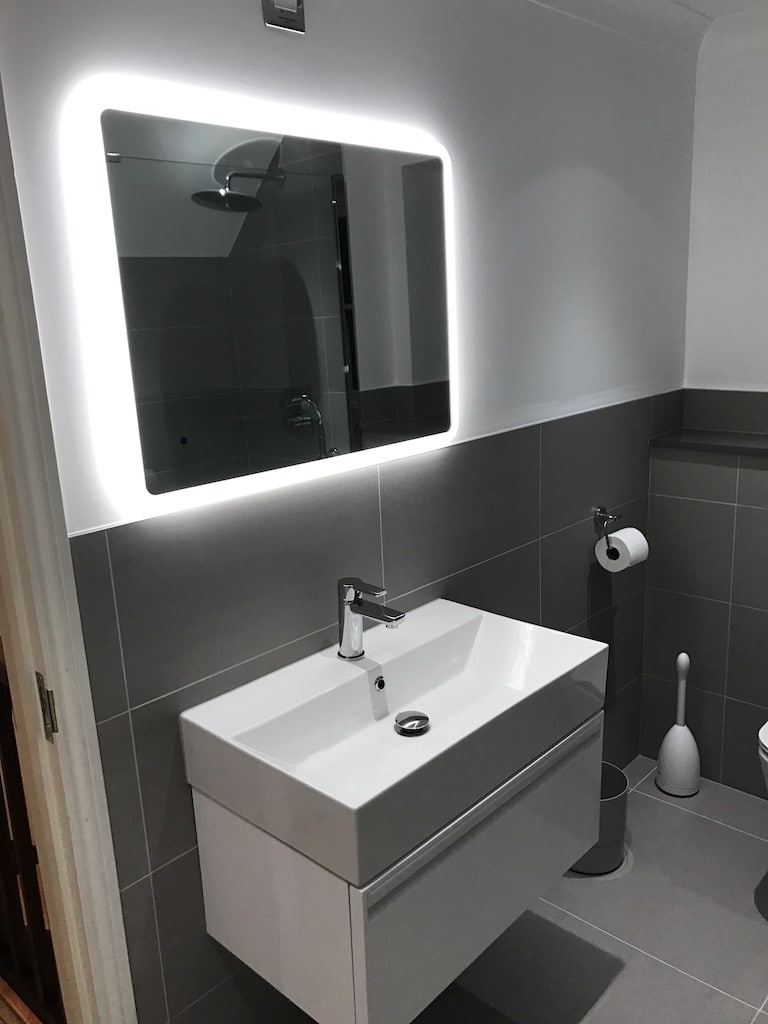 Beautiful LED mirror installed as part of Bathroom Conversion to Shower Room project in Great Doddington